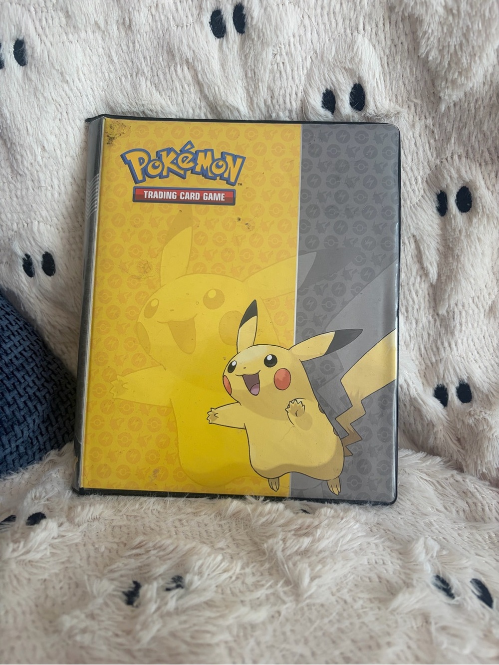 Pokemon pikachu card binder + lots of cards included.